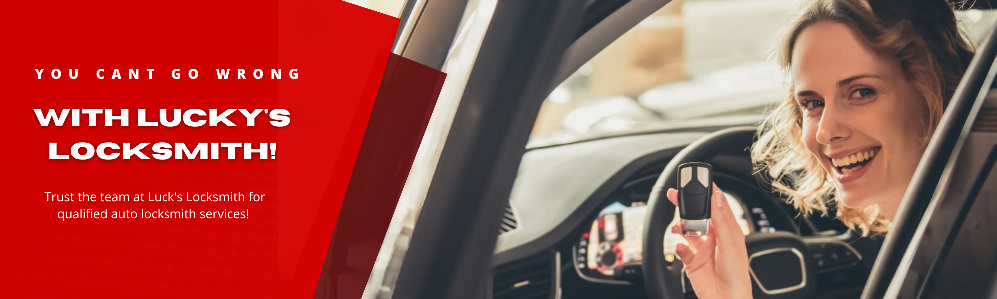 woman in car holding keys smiling